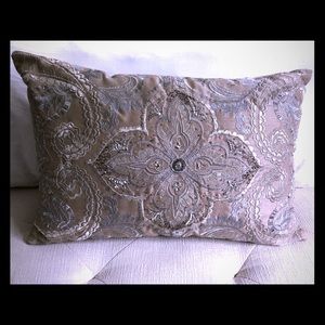 Beaded tan pillow with silver accents